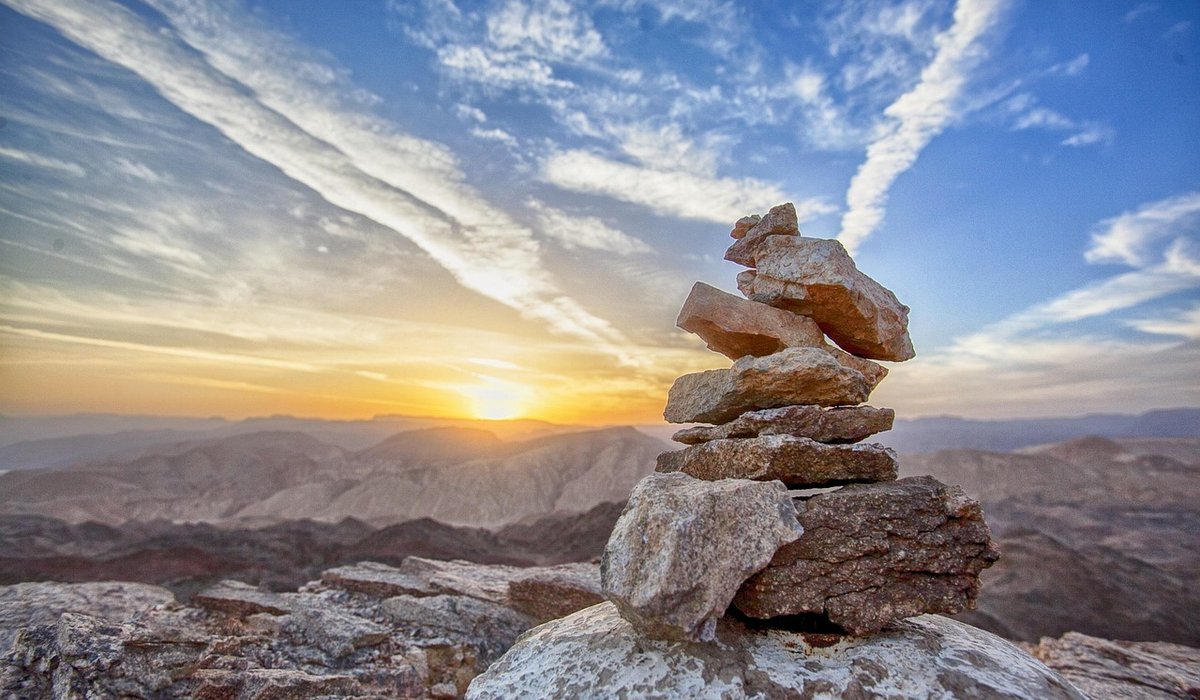 Using trekking poles to reduce knee strain